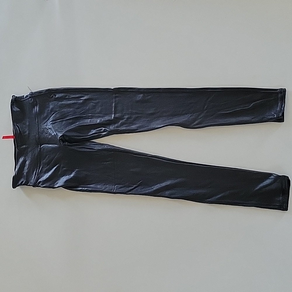 Spanx black leather like leggings in size Small